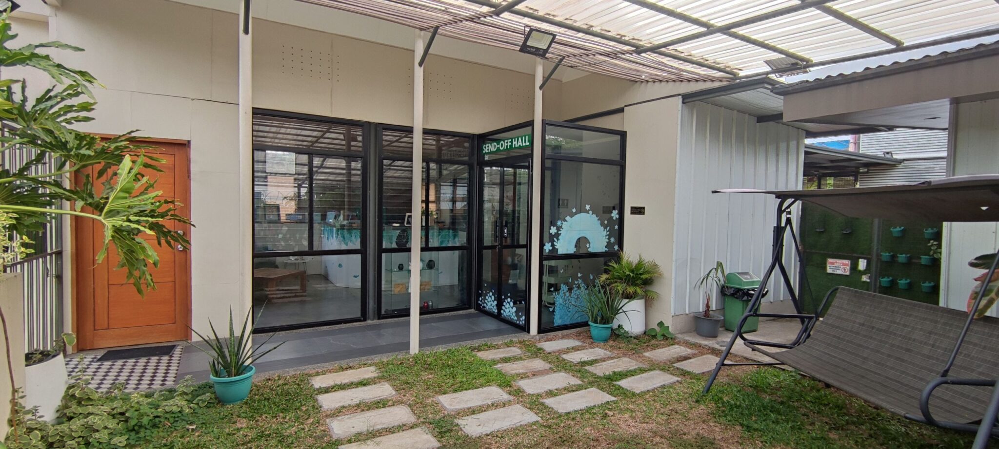Our entrance, with a garden path to the send-off hall
